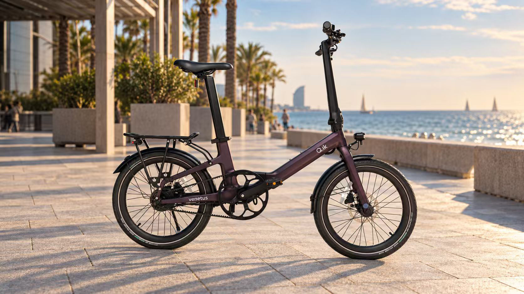 Q.ik folding electric bicycle by a waterfront promenade