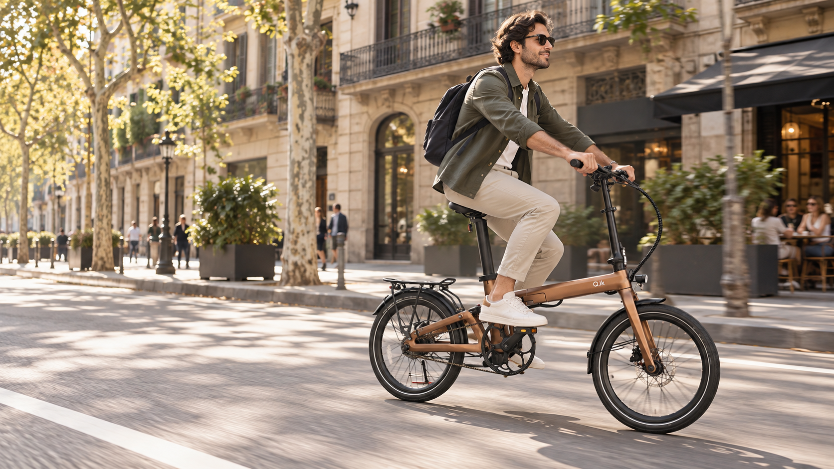 Rider on a Q.ik folding electric bicycle in a European city